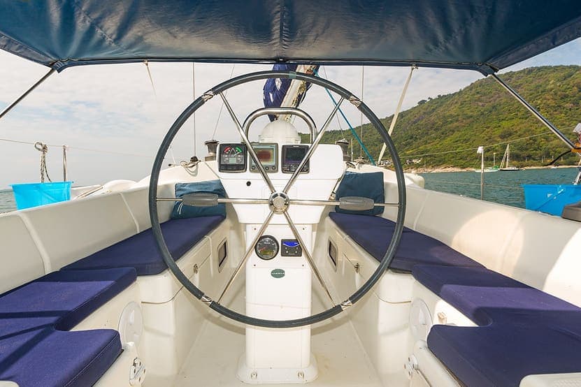 Yacht cockpit with wheel and bimini ready for departure