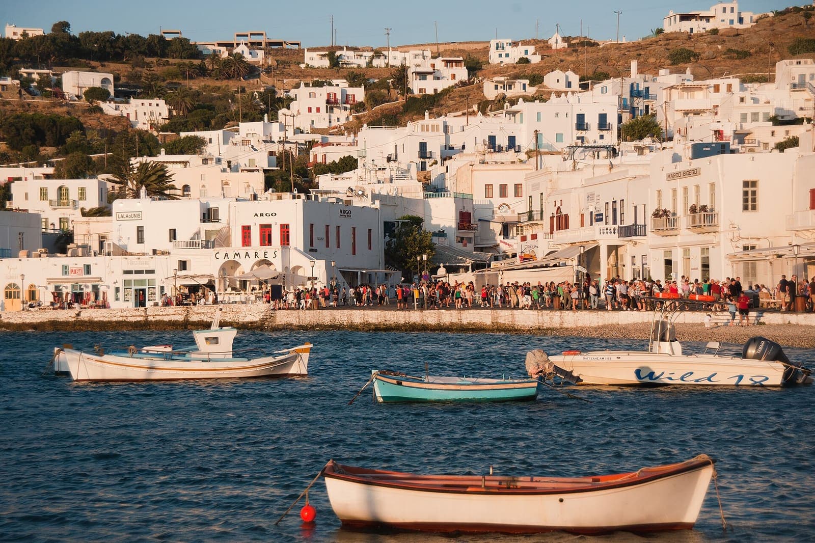 Boats moored along the waterfront of Mykonos town, Greece