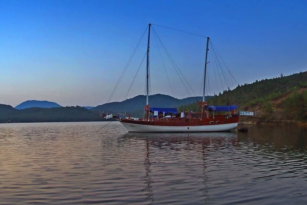 Wooden gulet anchored in a quiet Turkish bay