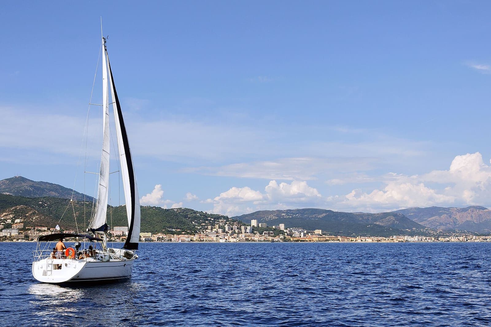 Sailing yacht cruising in the Bay of Ajaccio, Corsica