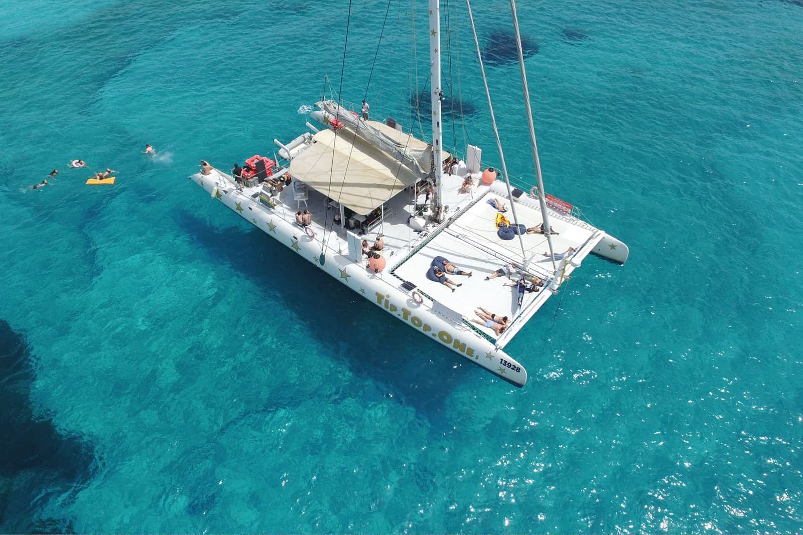 Frigate Bird — Catamaran at anchor in Armier Bay, Malta