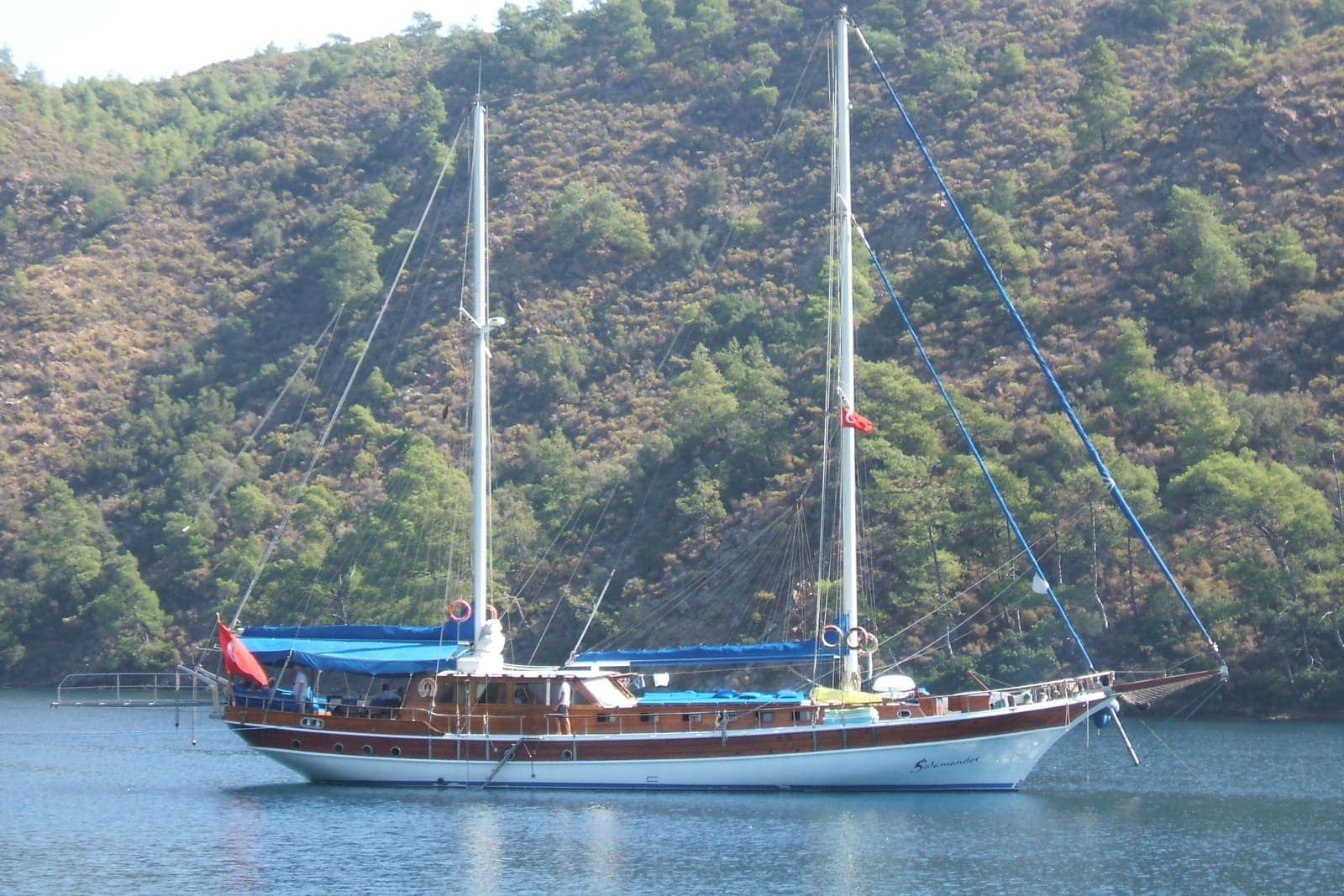 Calypso — Traditional wooden gulet anchored in a green Turkish bay