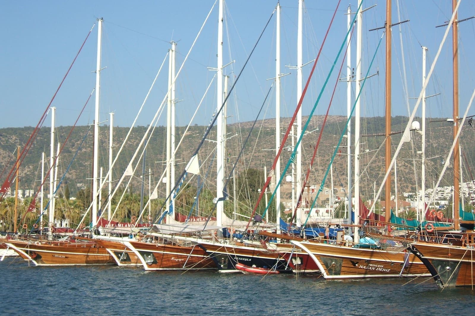 Ece Sultan — Row of wooden gulets moored in Bodrum harbour