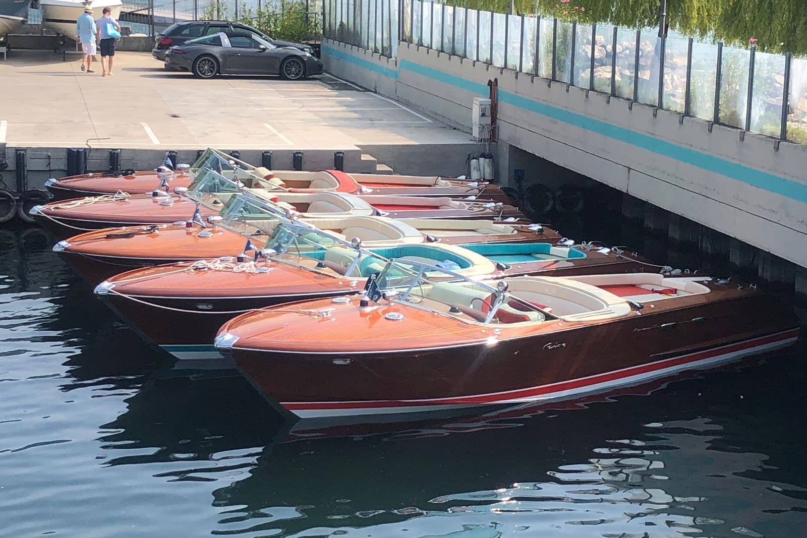 Bon Vent — Classic Riva runabouts moored on Lake Garda