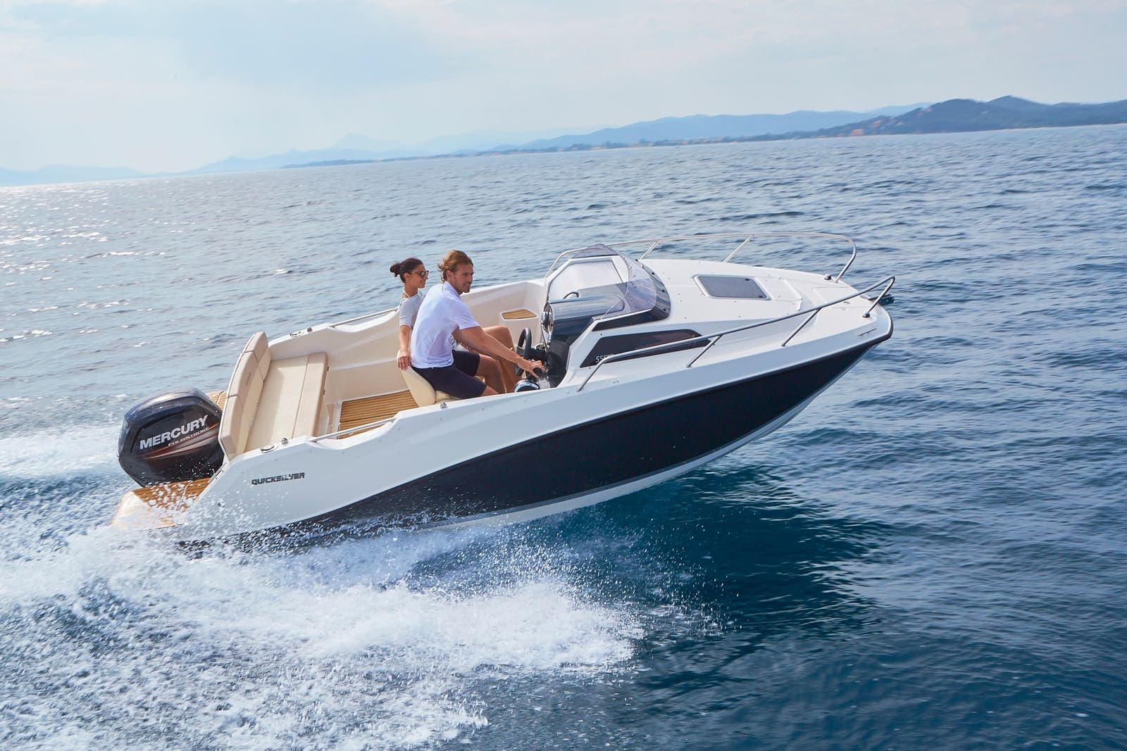 Marea — Quicksilver Activ 555 Cabin motorboat cruising on open water