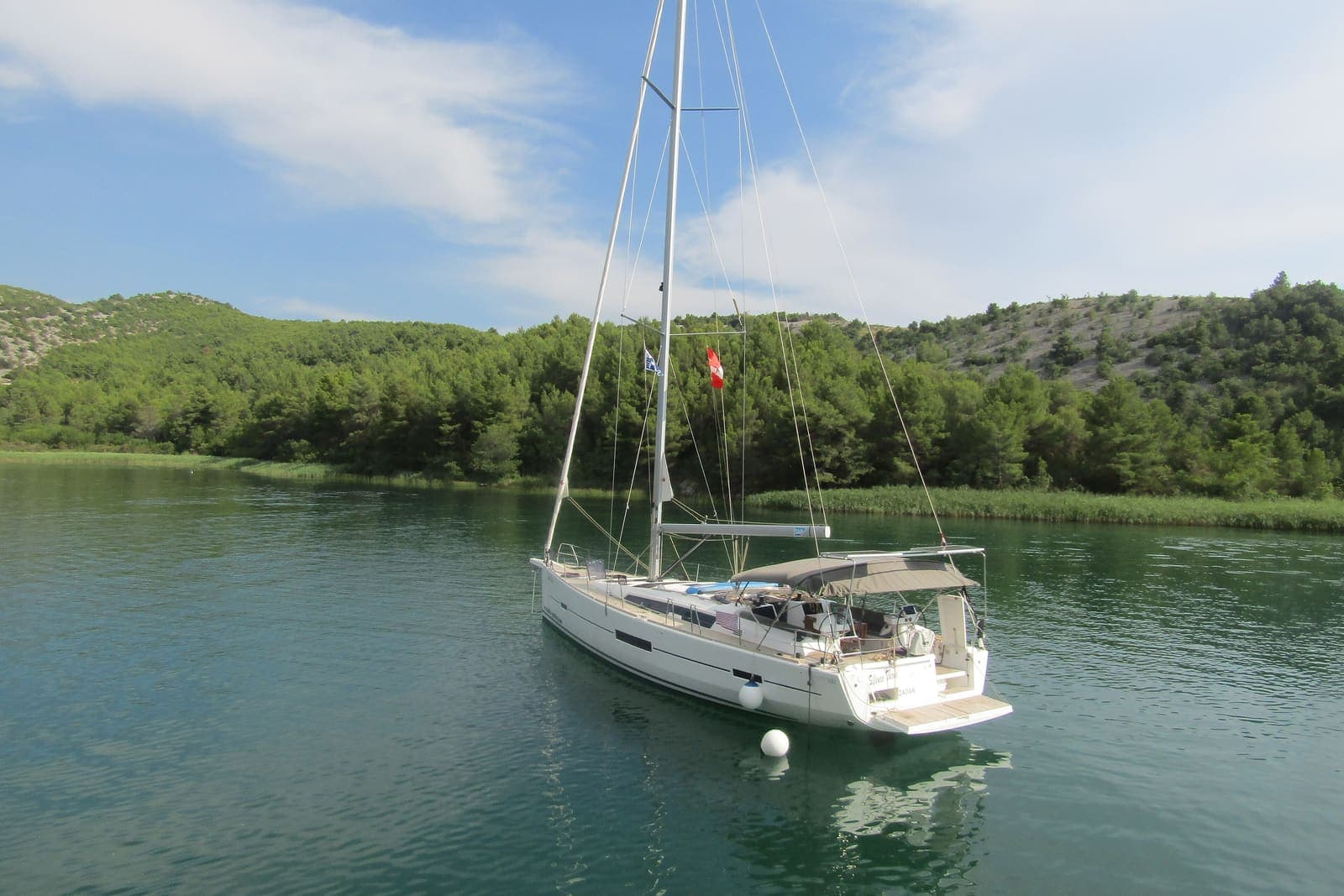 Scirocco — Dufour 520 sailing yacht moored in Krka National Park, Croatia